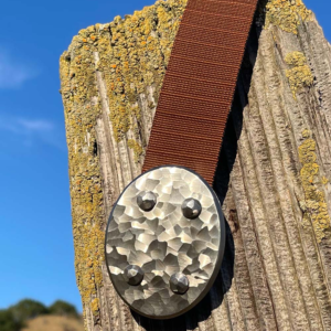 Stainless Steel Oval buckle with 3D Scalloped Camo finish.