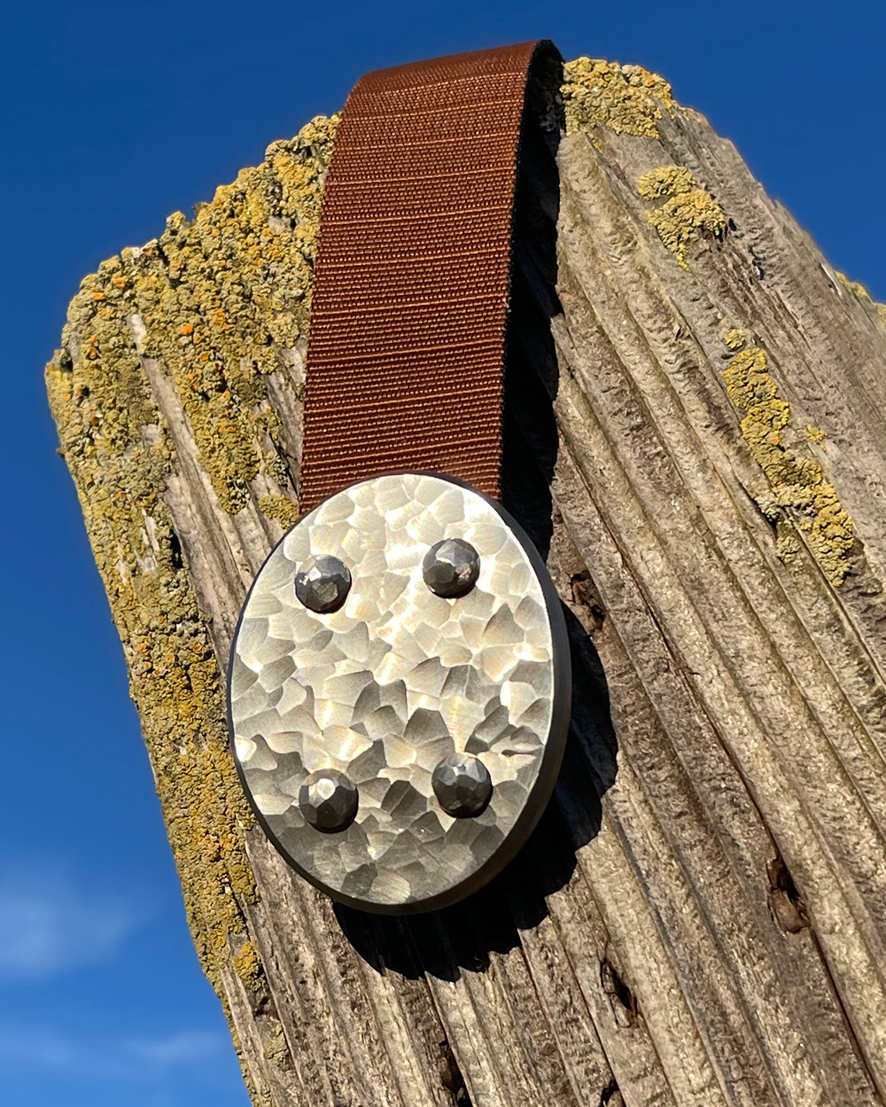 Stainless Steel Oval buckle with 3D Scalloped Camo finish.