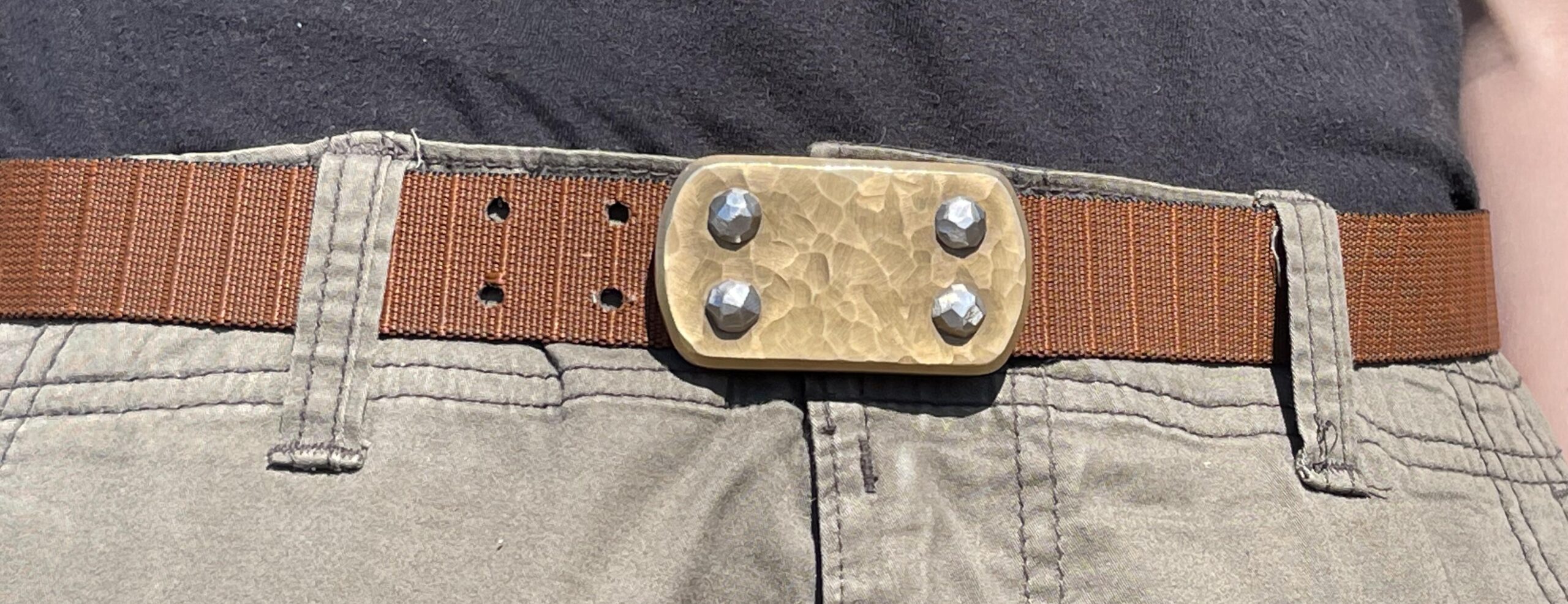 Standard size Sculpted brass buckle on belt