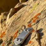Phantom: 3.5 oz bantam buckle with Gray Man finish and nylon webbing