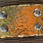 Motopos belt standard brass buckle with hammered and polished Rogue Moon finish on front, sides and bolt heads