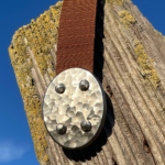 Stainless Steel Oval buckle with 3D Scalloped Camo finish.