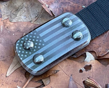 Toughest belt buckle engraved with USA flag and heavy duty nylon belt strap.
