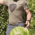 One blow with a SIEGE Belt destroys a watermelon